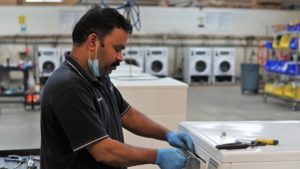 Repairman answering a service request